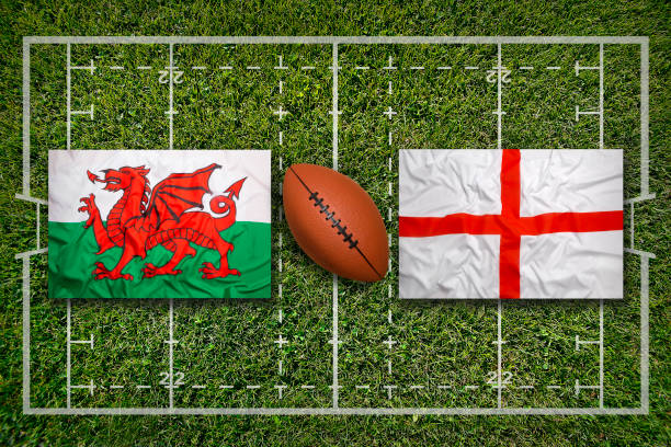 Wales vs. England flags on green rugby field
