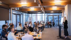 Ainslie addressing attendees